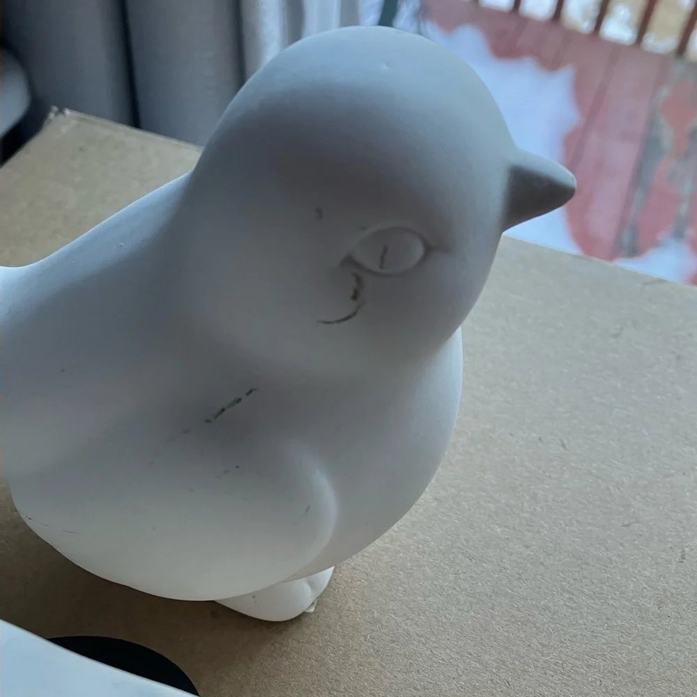 Unpainted bisque ceramic unfinished bird and strawberry cake figurines pottery